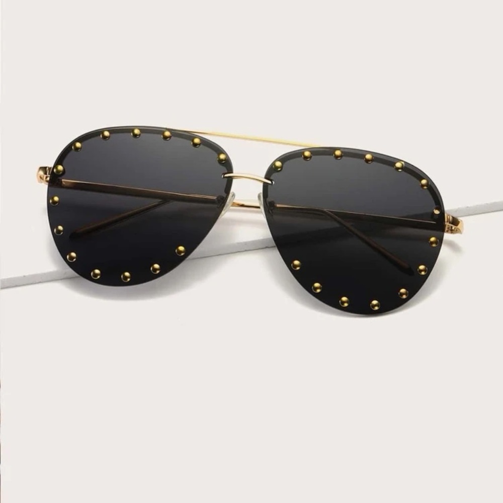 Stylish black and gold sunglasses